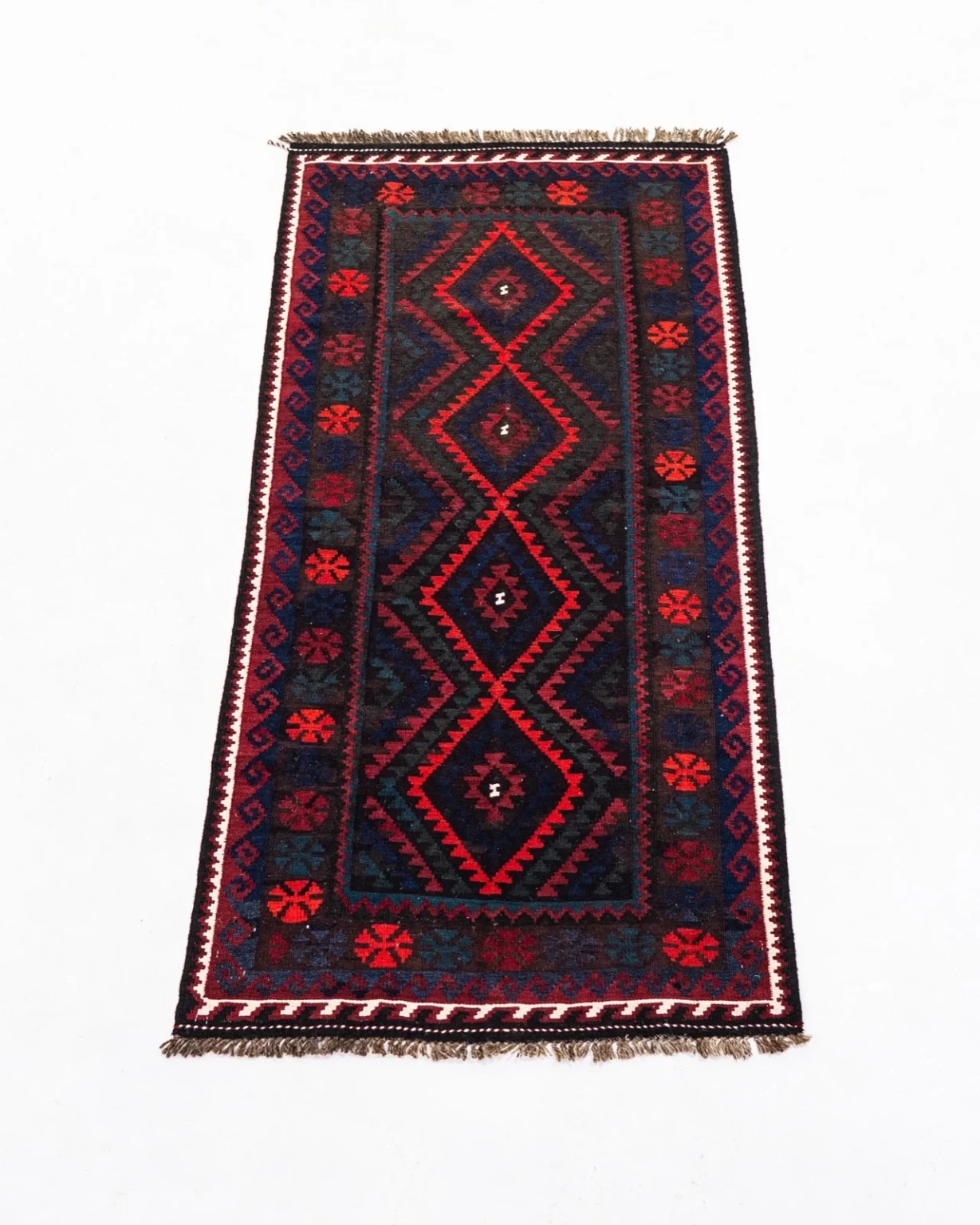 Kilim afgano de rombos rojos sobre fondo índigo